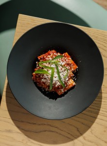 Authentic Rigatoni alla Norma served at Azzurra Chelsea, featuring slow-cooked tomato sauce, aubergine and Italian cheese inspired by Sicily.