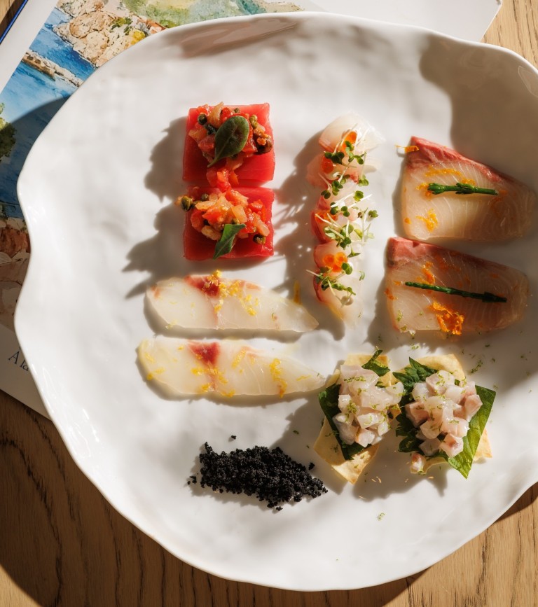 Selection of premium seafood crudo and carpaccio served at Azzurra Chelsea, featuring sustainably sourced Mediterranean seafood and elegant Italian presentation.