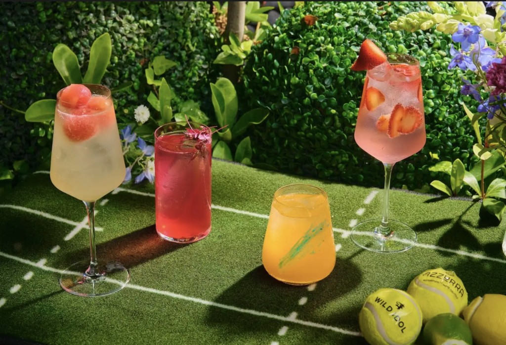 Signature summer cocktails at Azzurra Chelsea, including strawberry and citrus creations inspired by Wimbledon season and al fresco dining in Chelsea.