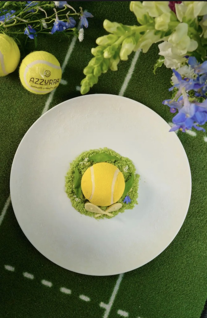 Wimbledon-inspired tennis ball dessert at Azzurra Chelsea, creatively plated with edible flowers and seasonal flavours for summer dining in London.